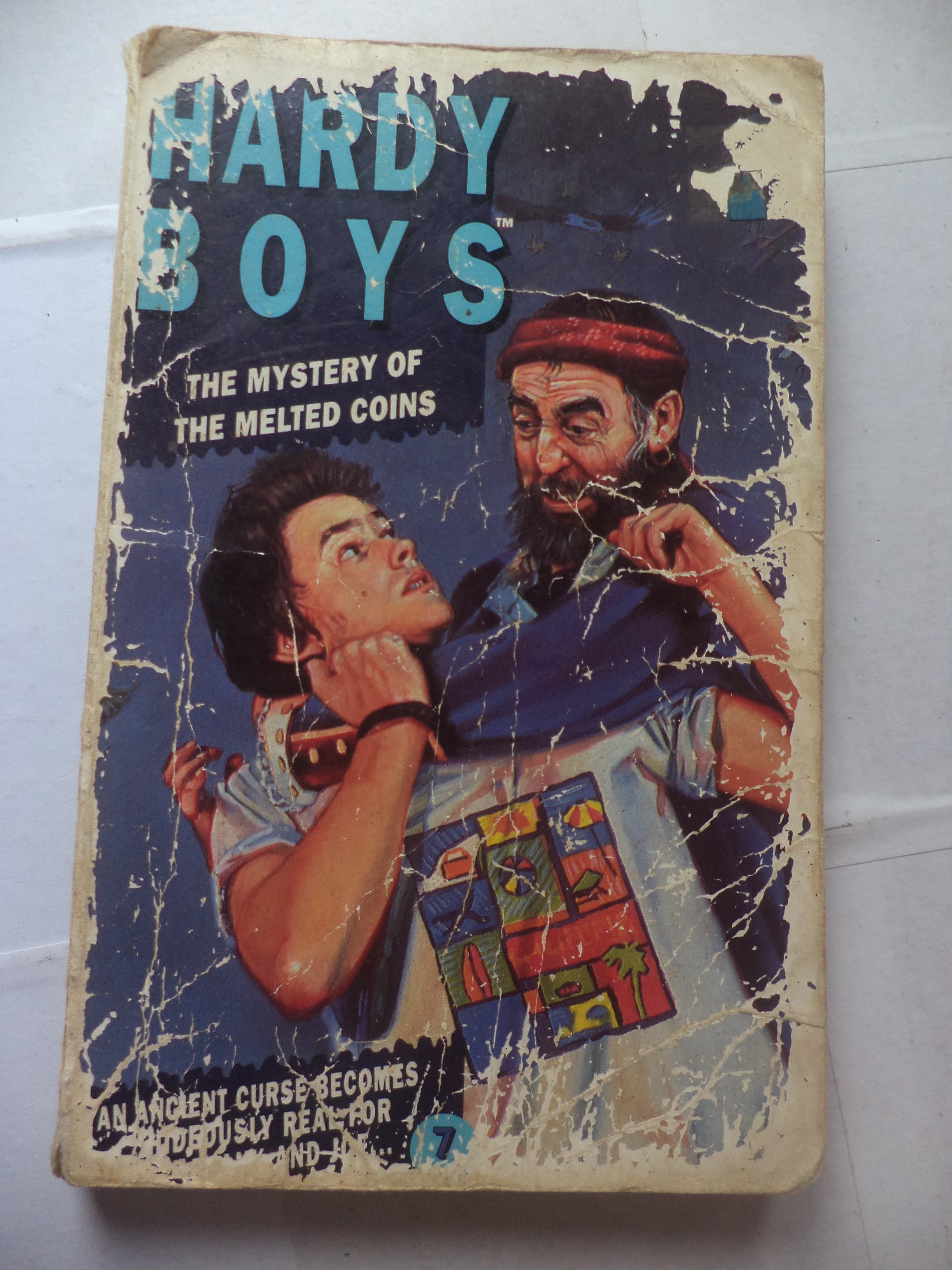 The Mystery of the Melted Coins (Hardy Boys Mystery Stories)
